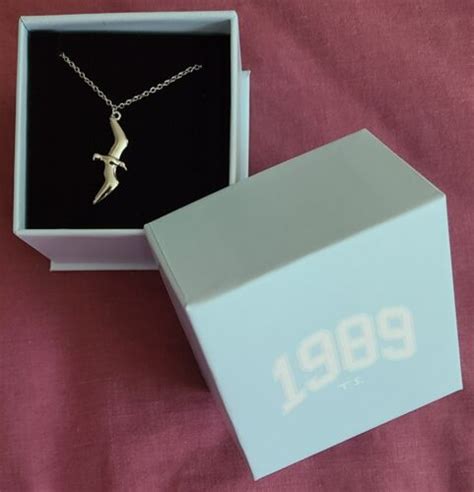 1989 seagull necklace - Seagull necklace from her 1989 album collection and is .925 silver. Measures approximately 50 cm in length. This custom necklace is brand new and ships with its original box (pictured).